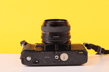 Load image into Gallery viewer, Minolta X-7A 35mm SLR Film Camera with MD 50mm f/1.7 Lens
