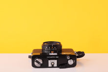 Load image into Gallery viewer, Minolta Hi-Matic G2 35mm Rangefinder 35mm Film Camera with 38mm f/2.8 Minolta Lens
