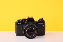 Load image into Gallery viewer, Praktica BC1 Electronic 35mm SLR Film Camera with Pentacon Prakticar 50mm f/1.8 MC Lens
