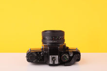 Load image into Gallery viewer, Praktica BC1 Electronic 35mm SLR Film Camera with Pentacon Prakticar 50mm f/1.8 MC Lens
