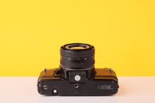 Load image into Gallery viewer, Praktica BC1 Electronic 35mm SLR Film Camera with Pentacon Prakticar 50mm f/1.8 MC Lens
