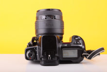 Load image into Gallery viewer, Canon EOS 10 35mm SLR Film Camera with Sigma UC Zoom 70–210mm f/4–5.6 Lens
