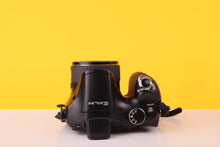 Load image into Gallery viewer, Casio Exilim EX-FH25 10.1MP Digital Camera with 20x Optical Zoom Lens
