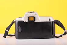 Load image into Gallery viewer, Nikon F50 35mm SLR Film Camera with Nikon AF Nikkor 35–80mm Zoom Lens
