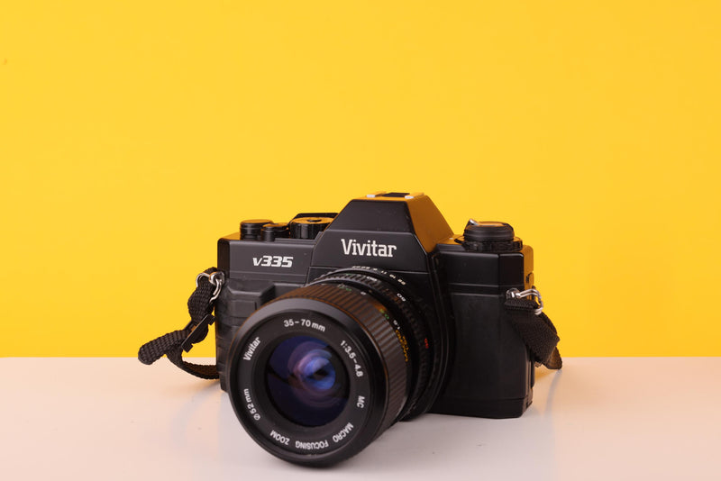 Vivitar V335 35mm SLR Film Camera + Vivitar 35-70mm f/3.5-4.8 Macro Focusing Zoom Lens
