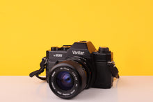 Load image into Gallery viewer, Vivitar V335 35mm SLR Film Camera + Vivitar 35-70mm f/3.5-4.8 Macro Focusing Zoom Lens
