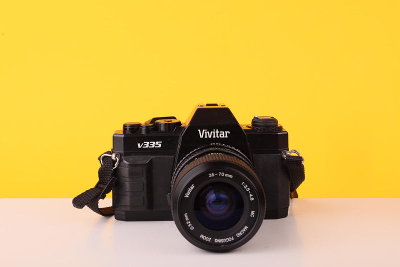 Vivitar V335 35mm SLR Film Camera + Vivitar 35-70mm f/3.5-4.8 Macro Focusing Zoom Lens