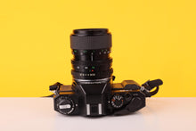 Load image into Gallery viewer, Vivitar V335 35mm SLR Film Camera + Vivitar 35-70mm f/3.5-4.8 Macro Focusing Zoom Lens
