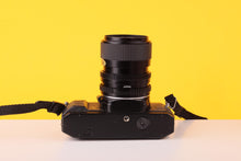 Load image into Gallery viewer, Vivitar V335 35mm SLR Film Camera + Vivitar 35-70mm f/3.5-4.8 Macro Focusing Zoom Lens
