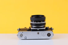 Load image into Gallery viewer, Nikon FM2 35mm SLR Film Camera with Nikon nikkor 50mm f/1.8 Lens
