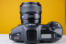 Load image into Gallery viewer, Minolta Dynax 9xi 35mm SLR Film Camera with 28-80mm f4-5.6 Lens
