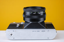 Load image into Gallery viewer, Zenit-E 35mm SLR Film Camera with Carl Zeiss 50mm f2.8 Lens
