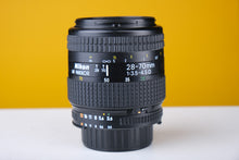 Load image into Gallery viewer, Nikkor 28-70mm f3.5-4.5 D Boxed Lens
