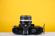 Load image into Gallery viewer, Yashica TL Electro X 35mm SLR Film Camera with Carl Zeiss 50mm f2.8 Tessar Lens
