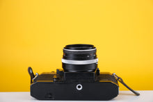 Load image into Gallery viewer, Yashica TL Electro X 35mm SLR Film Camera with Carl Zeiss 50mm f2.8 Tessar Lens
