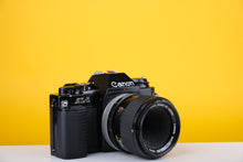 Load image into Gallery viewer, Canon AL-1 SLR 35mm Film Camera with Canon SSC Macro 50mm f3.5 Lens
