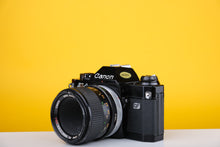 Load image into Gallery viewer, Canon AL-1 SLR 35mm Film Camera with Canon SSC Macro 50mm f3.5 Lens
