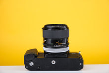Load image into Gallery viewer, Canon AL-1 SLR 35mm Film Camera with Canon SSC Macro 50mm f3.5 Lens
