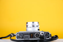 Load image into Gallery viewer, Yashica Electro 35 GS 35mm Rangefinder Film Camera with Extra Lenses
