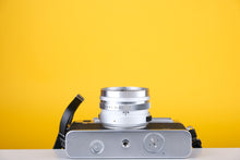 Load image into Gallery viewer, Yashica Electro 35 GS 35mm Rangefinder Film Camera with Extra Lenses
