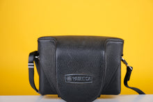 Load image into Gallery viewer, Yashica Electro 35 GS 35mm Rangefinder Film Camera with Extra Lenses
