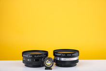 Load image into Gallery viewer, Yashica Electro 35 GS 35mm Rangefinder Film Camera with Extra Lenses
