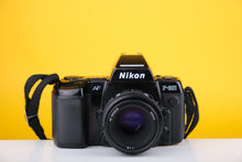 Load image into Gallery viewer, Nikon AF F801 35mm SLR Film Camera with 50mm f1.8
