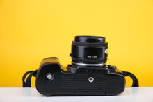 Load image into Gallery viewer, Nikon AF F801 35mm SLR Film Camera with 50mm f1.8
