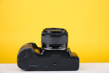 Load image into Gallery viewer, Minolta Dynax 3xi 35mm SLR Film Camera with 28mm f2.8 Lens
