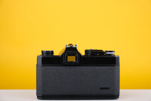 Load image into Gallery viewer, Topcon RE200 35mm SLR Film Camera with 55mm f1.7 Lens
