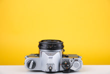 Load image into Gallery viewer, Pentax MX 35mm SLR Film Camera with 40mm f2.8 Lens and New Grey Leather
