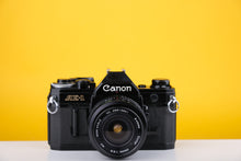 Load image into Gallery viewer, Canon AE-1 35mm SLR Film Camera with Vivitar 28mm f2.8 Lens
