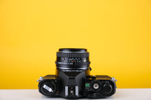 Load image into Gallery viewer, Pentax MG Black 35mm SLR Film Camera with 50mm f2
