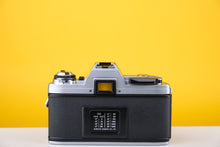 Load image into Gallery viewer, Minolta X-300 35mm SLR Film Camera with 35-70mm f3.5 Lens

