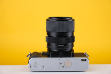 Load image into Gallery viewer, Minolta X-300 35mm SLR Film Camera with 35-70mm f3.5 Lens
