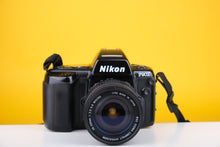 Load image into Gallery viewer, Nikon F90x 35mm SLR Film Camera with Sigma 28-200mm f3.5-5.6 Lens
