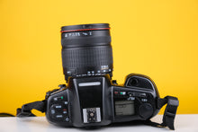 Load image into Gallery viewer, Nikon F90x 35mm SLR Film Camera with Sigma 28-200mm f3.5-5.6 Lens
