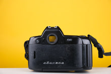 Load image into Gallery viewer, Nikon F90x 35mm SLR Film Camera with Sigma 28-200mm f3.5-5.6 Lens
