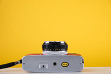 Load image into Gallery viewer, Olympus Trip 35 Vintage 35mm Film Camera with Customised Yellow and Red Leather Skin
