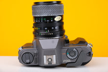 Load image into Gallery viewer, Pentax P30 35mm Film SLR with Miranda 28-70mm Lens
