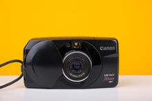 Load image into Gallery viewer, Canon Sure Shot 70 Zoom 35mm Point and Shoot Film Camera
