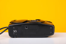 Load image into Gallery viewer, Canon Sure Shot 70 Zoom 35mm Point and Shoot Film Camera
