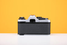Load image into Gallery viewer, Olympus OM10 35mm SLR Film Camera with Osawa 28mm f2.8 Lens
