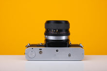 Load image into Gallery viewer, Olympus OM10 35mm SLR Film Camera with Osawa 28mm f2.8 Lens
