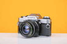 Load image into Gallery viewer, Olympus OM20 35mm Film Camera with Hanimex 28mm f/2.8 Lens
