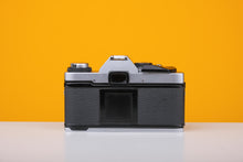 Load image into Gallery viewer, Olympus OM20 35mm Film Camera with Hanimex 28mm f/2.8 Lens
