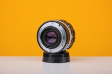 Load image into Gallery viewer, Nikkor-N Auto 24mm f/2.8 Pre AI Lens
