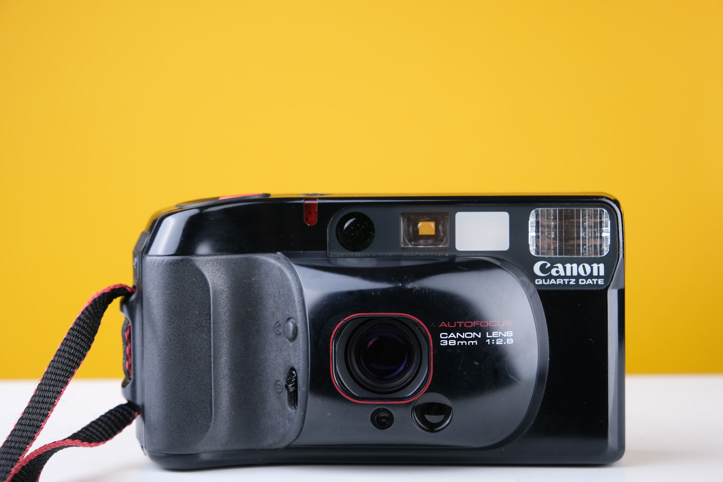 Canon Sureshot Supreme Quartz Date 35mm Point and Shoot Film Camera