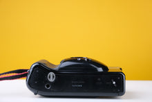 Load image into Gallery viewer, Canon Sureshot Supreme Quartz Date 35mm Point and Shoot Film Camera
