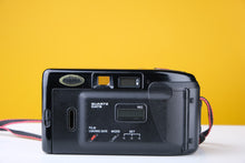 Load image into Gallery viewer, Canon Sureshot Supreme Quartz Date 35mm Point and Shoot Film Camera
